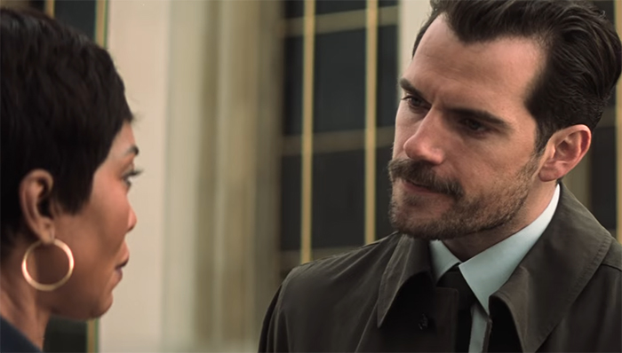 Henry Cavill also smoulders, but this time sporting a multi-million dollar moustache. Image Credit: Paramount Pictures/Bad Robot 