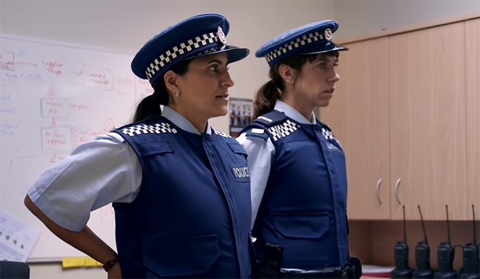 Mel and Jen just got caught in their fake police uniforms by the real police, awks.
