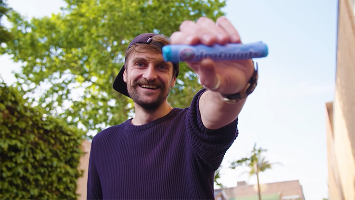 Nich 'Nichboy' Richardson demonstrating 'Deafmints' mints. Image Credit: Lowkii Productions.