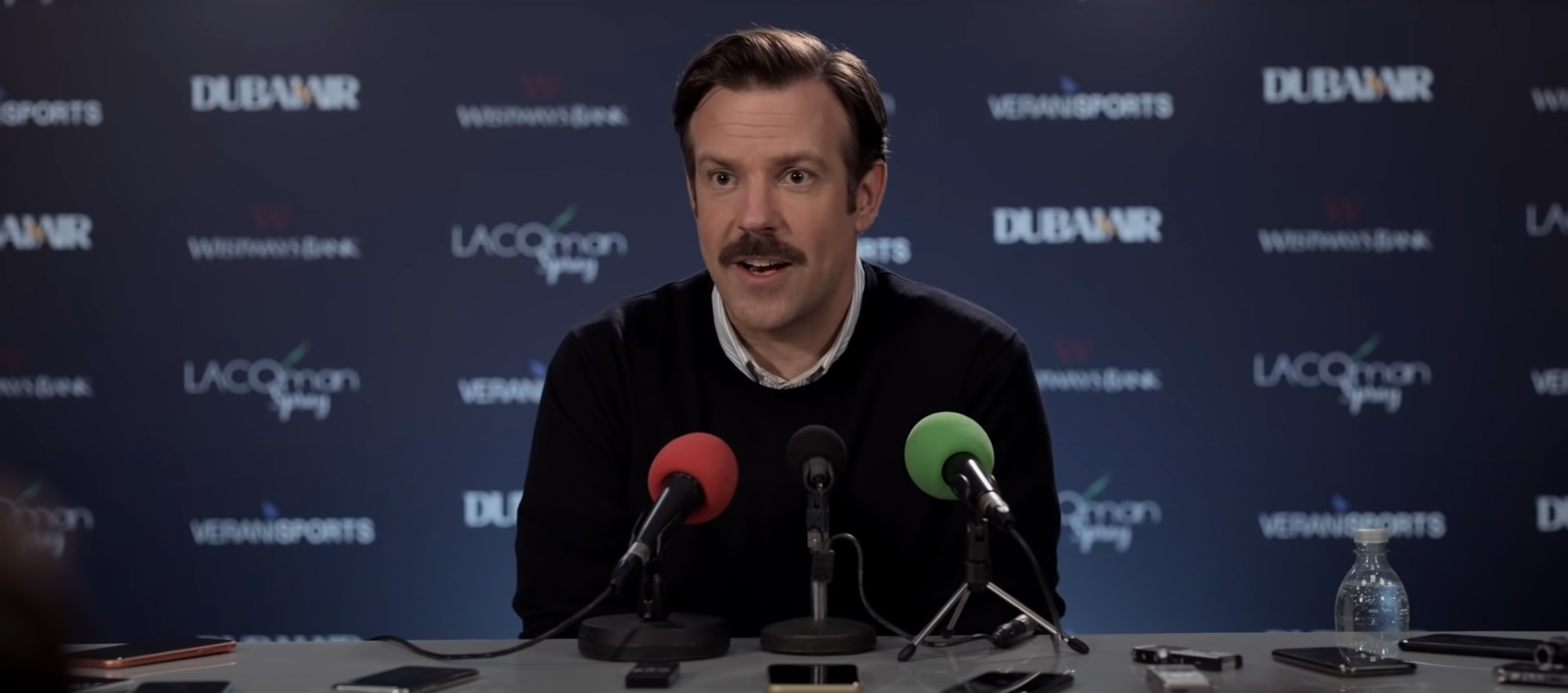 The Media Conference in Ted Lasso. Image Credit: Apple TV+.