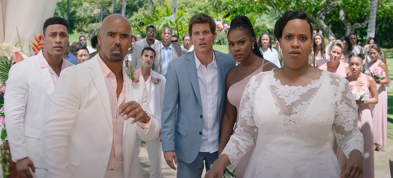 A wedding party about to get covered in snow