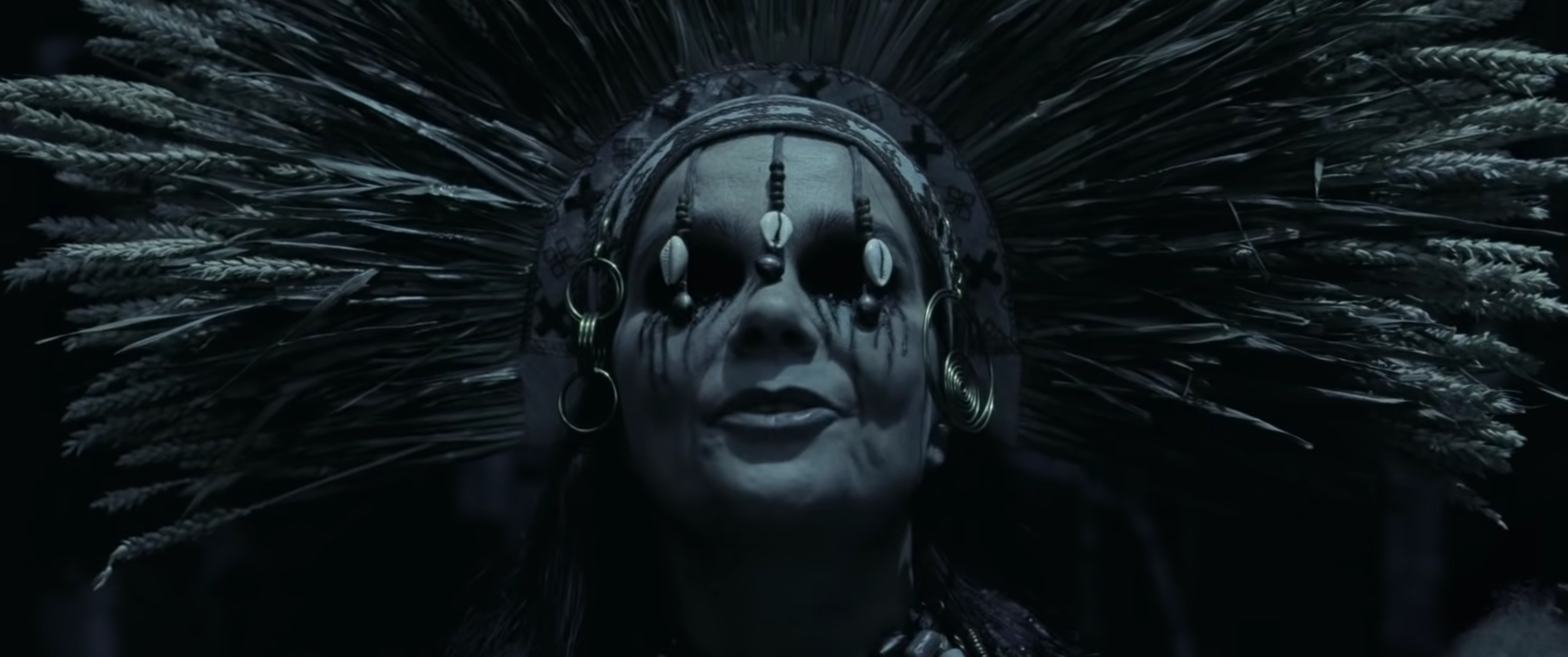 Bjork as a witch in a wheat headdress