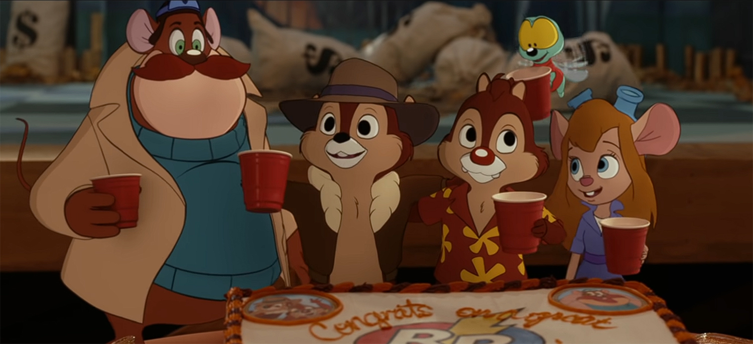 The Rescue Rangers celebrating with a cake