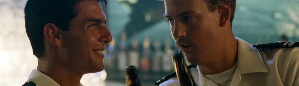 Maverick and Goose share a beer