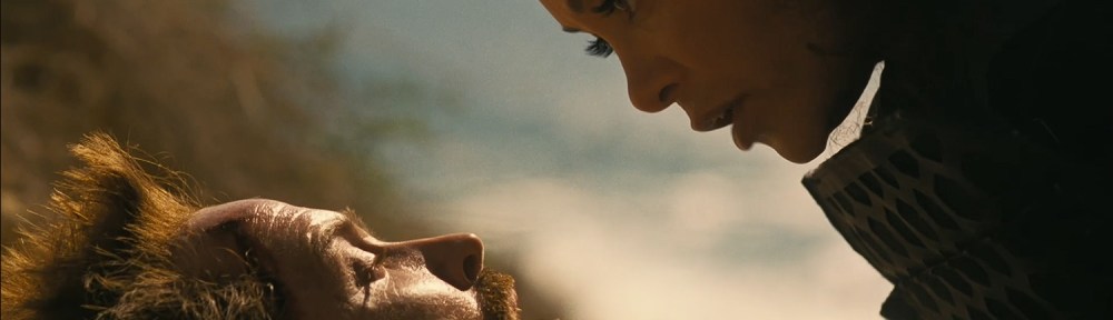 Maeve comforts Caleb as he lies possible dying.