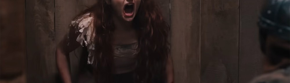 Joey King screams in rage at a dude.