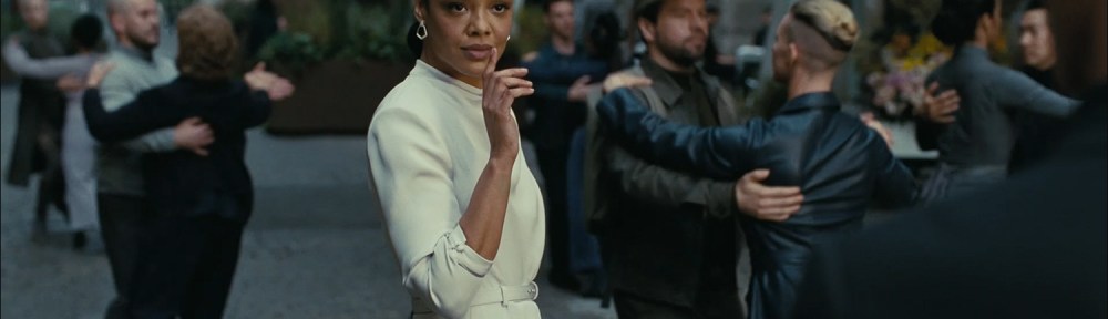 Tessa Thompson dances in the street.