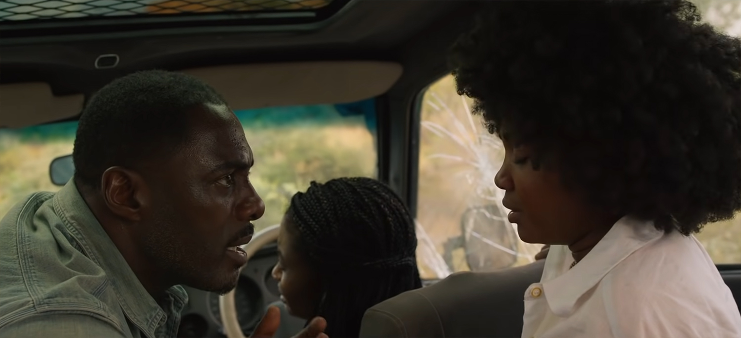 Idris tries to calm his daughters after the attack.