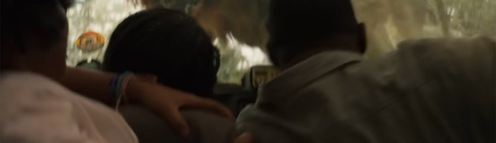 The Lion jumps on their car.