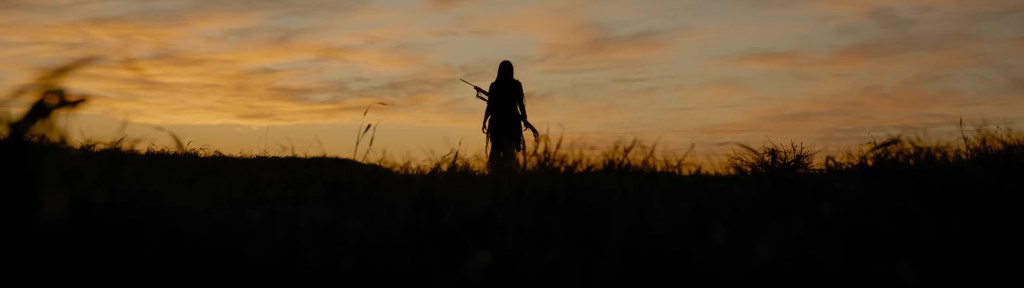 Naru looks into the sunset.