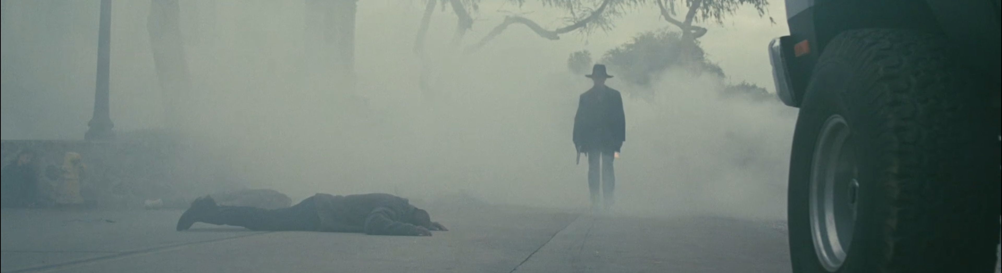 The Man In Black appears from the smoke.