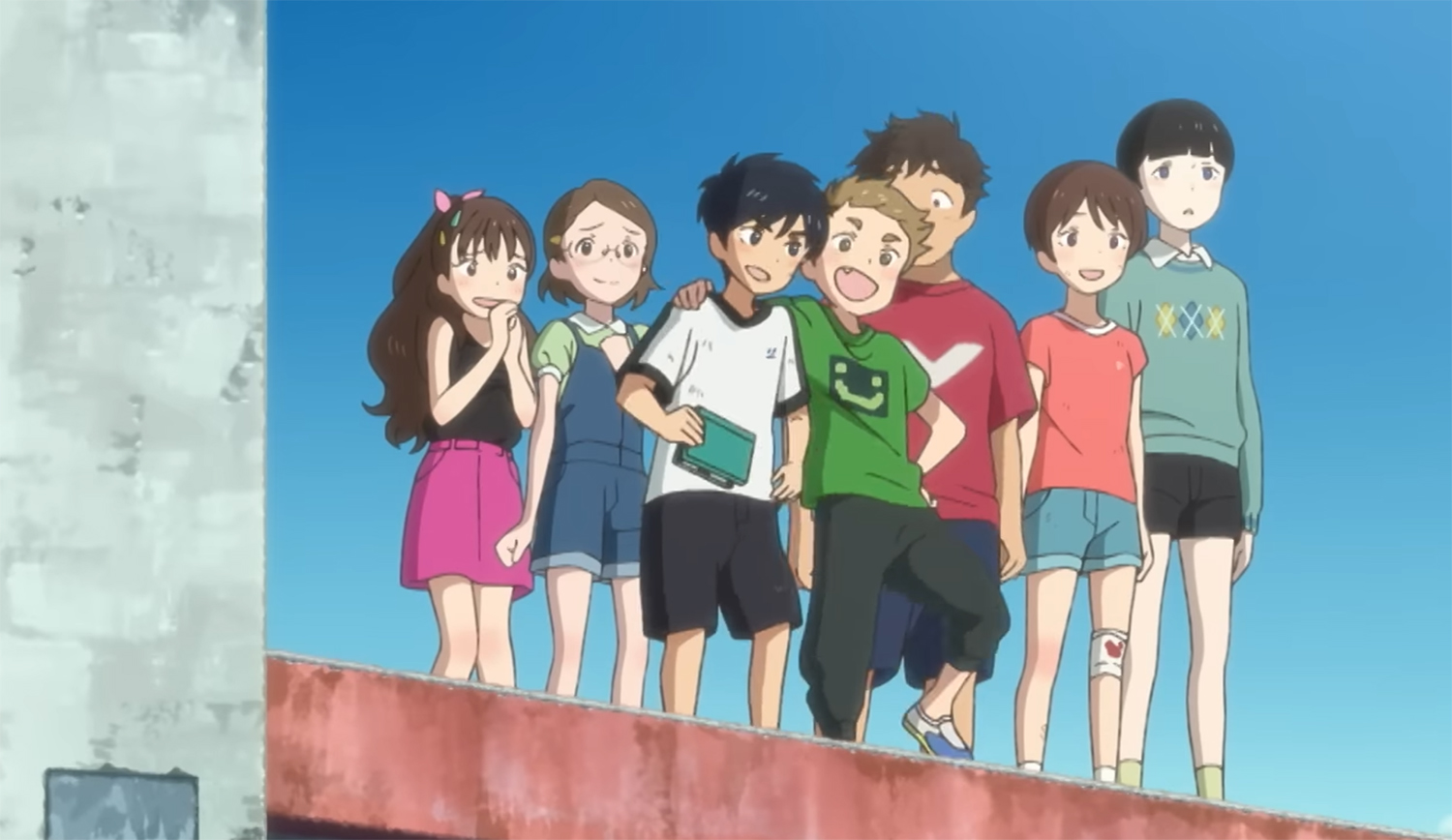 The gang on the top of the building looking out to the sea beyond.