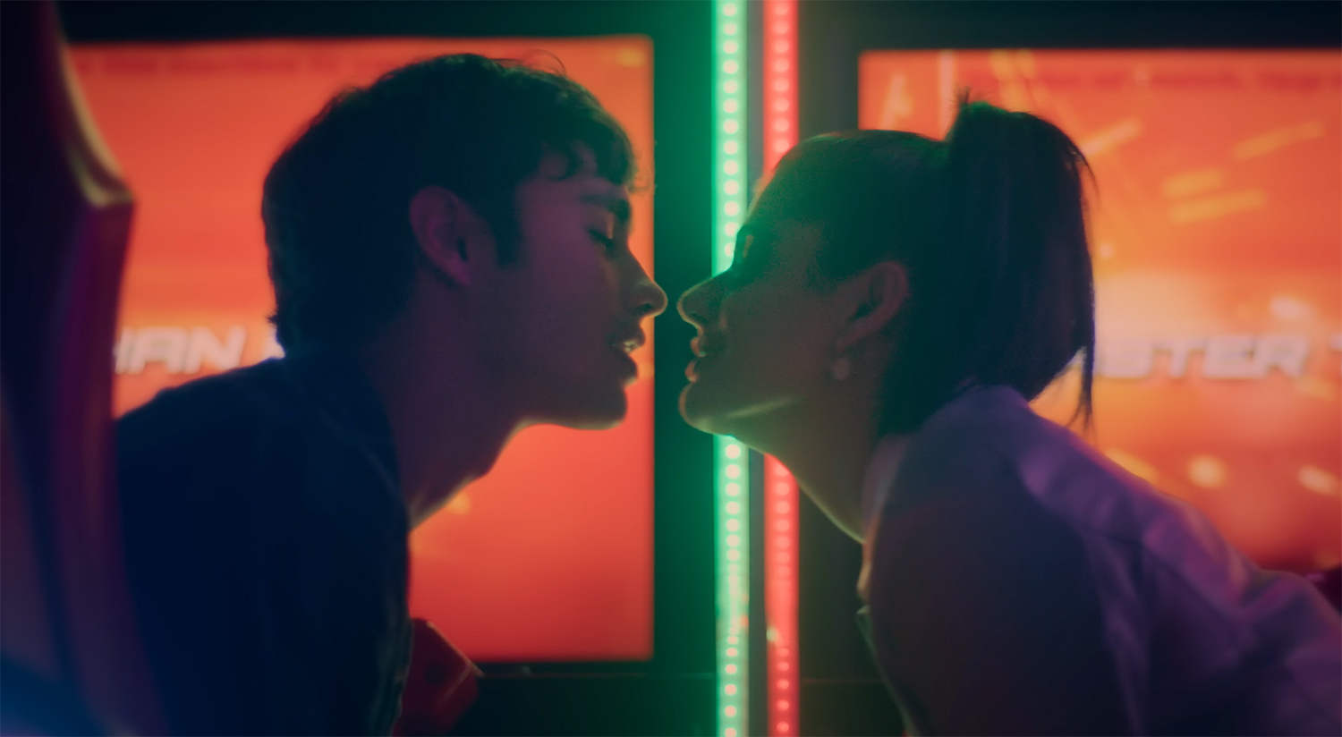 Malakai and Amerie kiss.