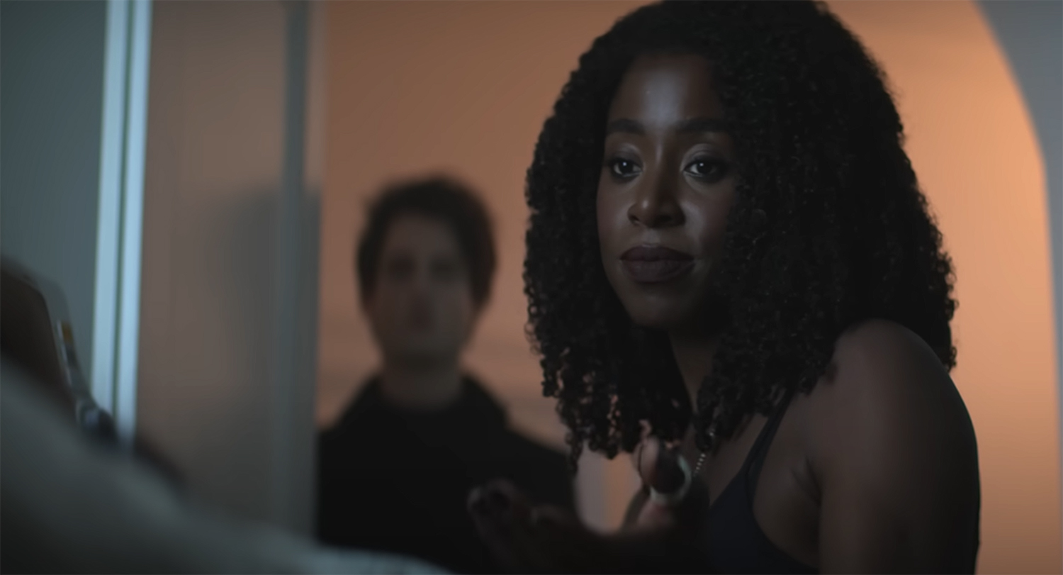 Death (Kirby Howell-Baptiste) helps someone to the other side.