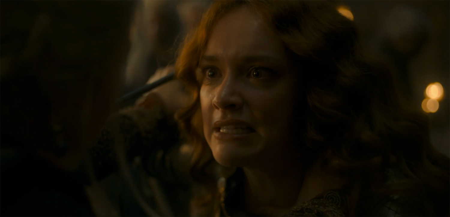 Alicent pulls a knife.