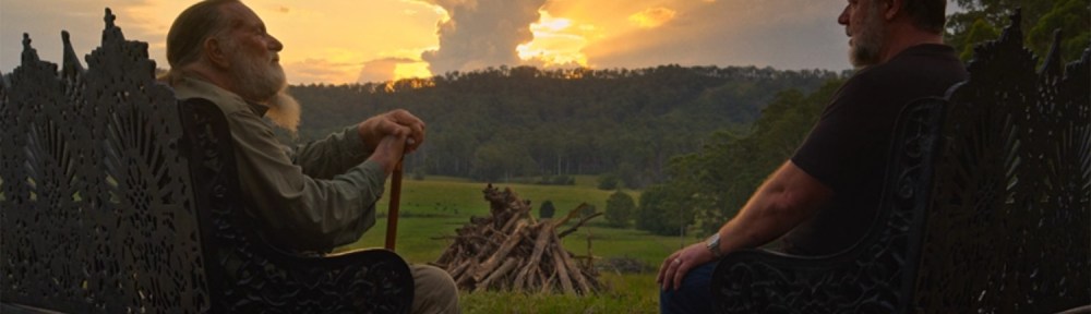 Men talking as the sun sets