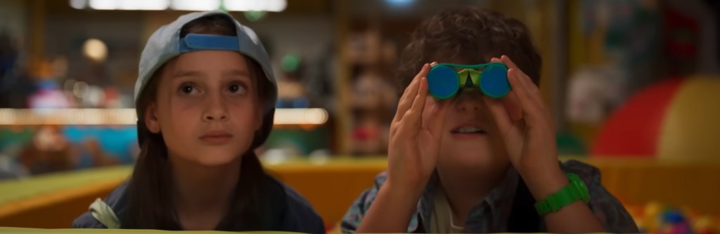 emerging from a ball pit