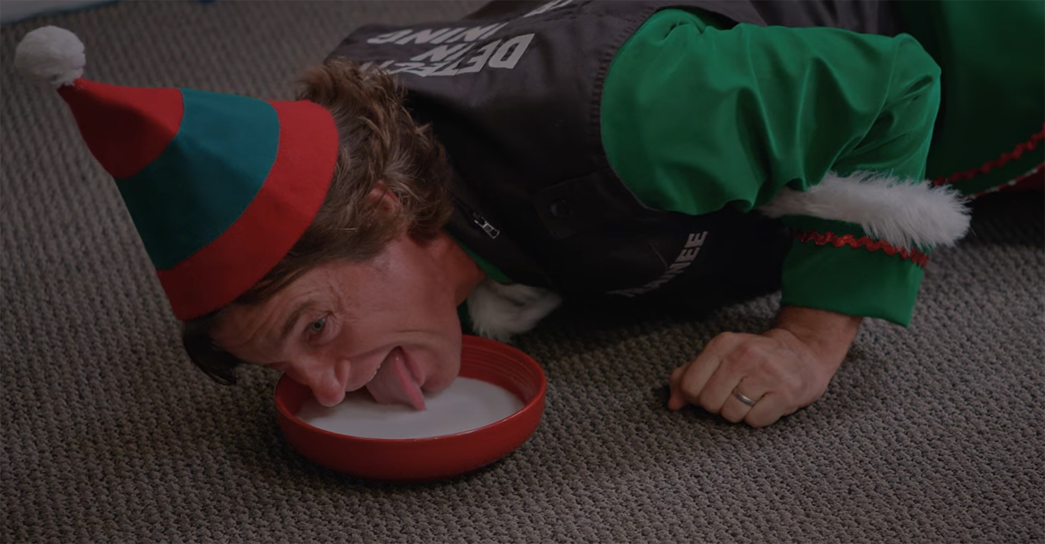 Jason Bateman licking up milk from a saucer.