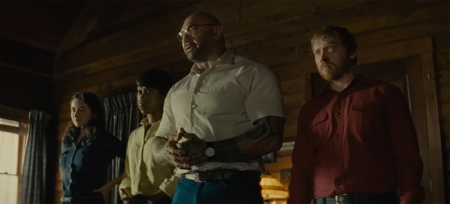 The four intruders confront the family.