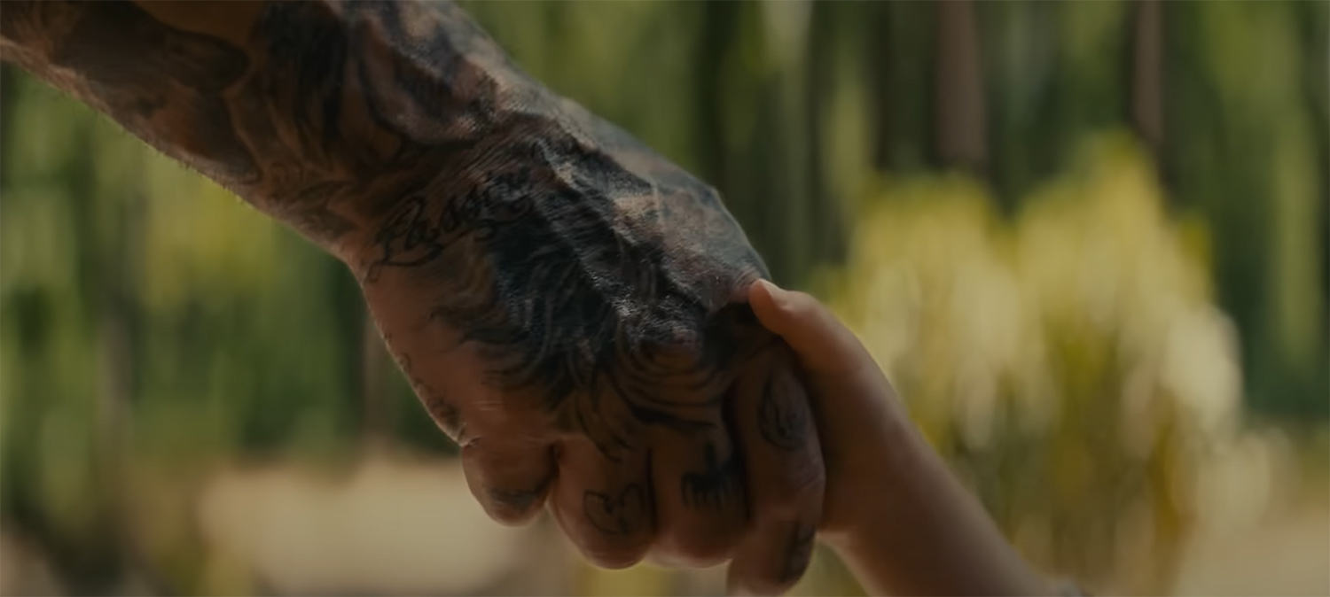 Leonard reaches down to shake Wen's hand.