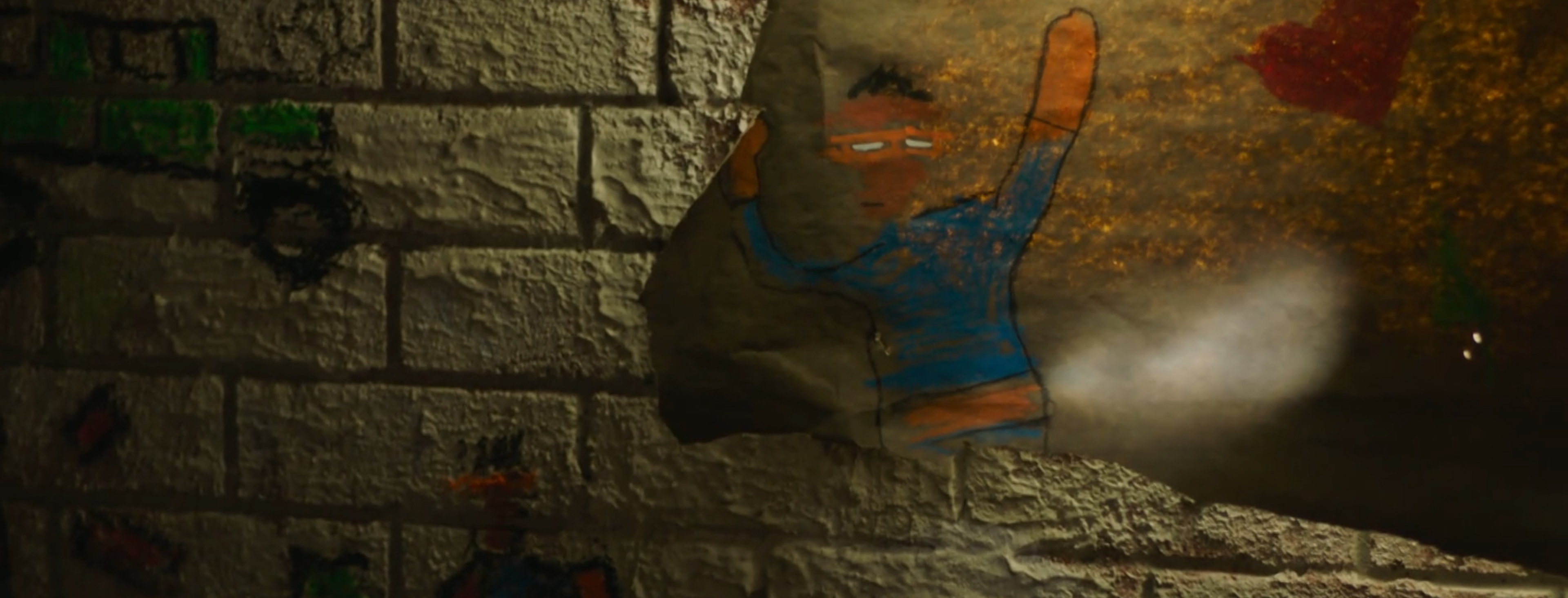 A child's drawing on the wall.