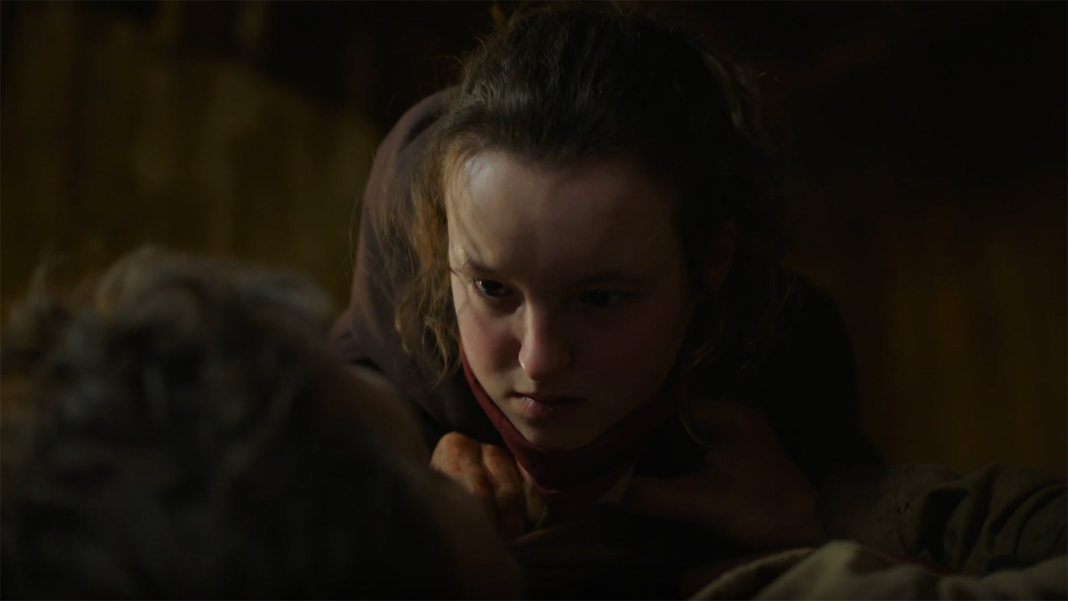 Ellie looks after a wounded Joel.