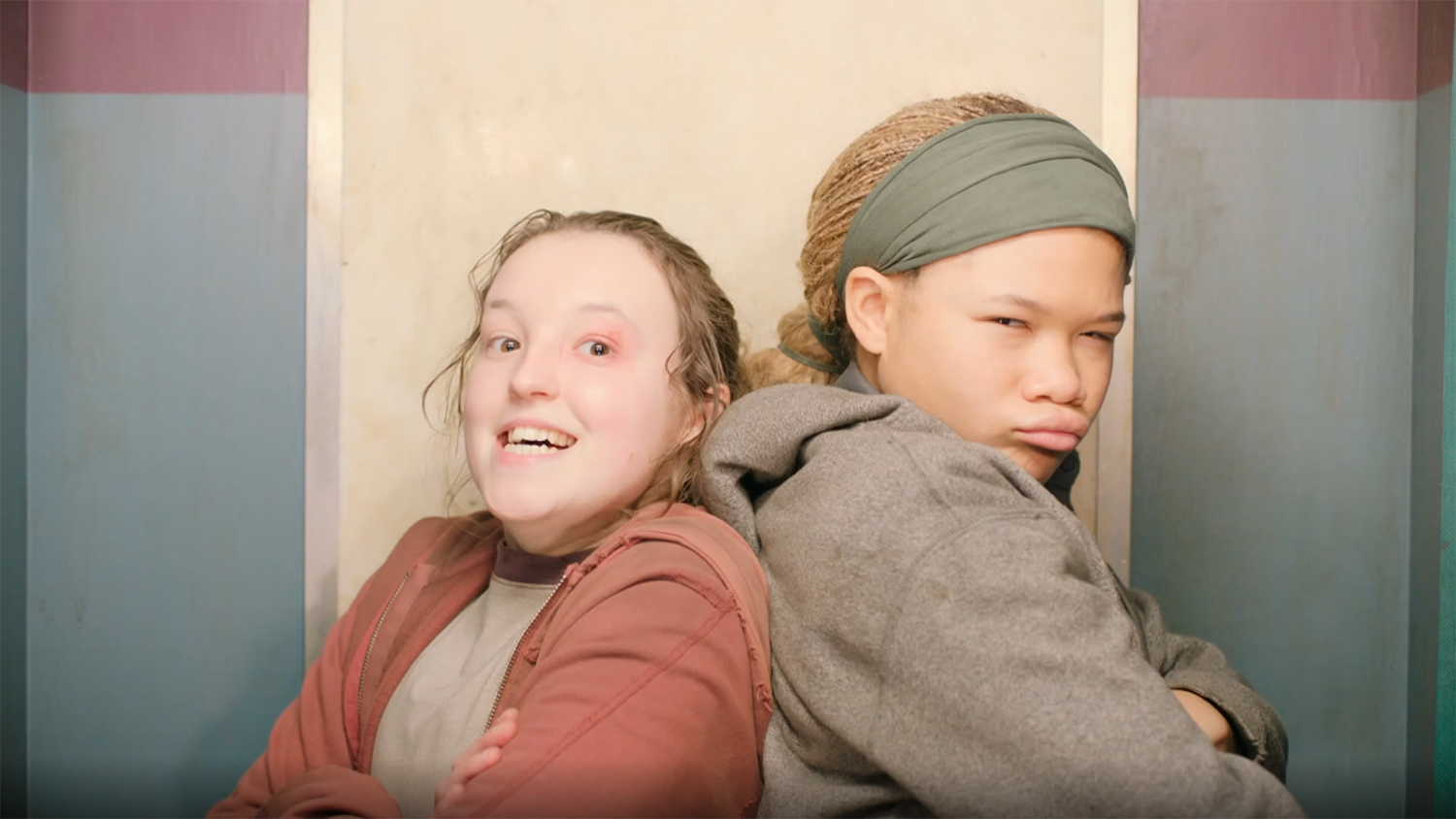 Ellie and Riley in a photobooth.