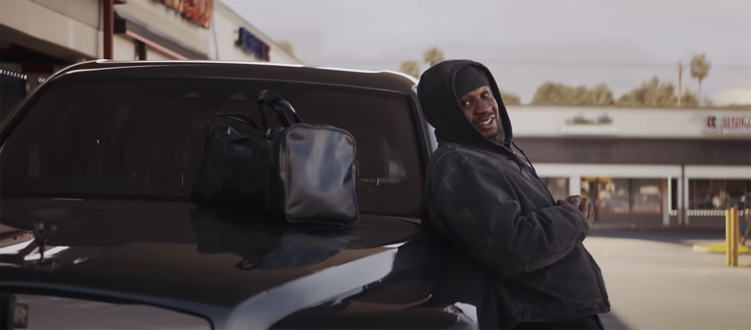 Dame waits on Donnie's car.