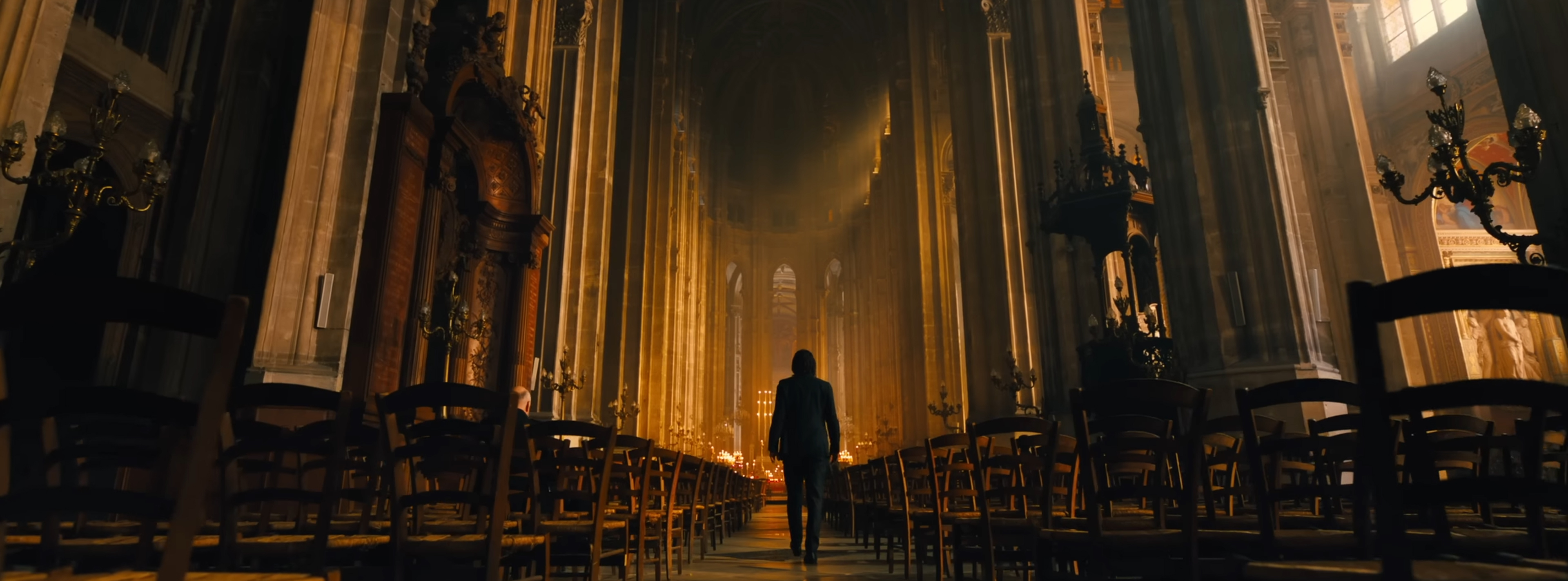 John walks into a cathedral.