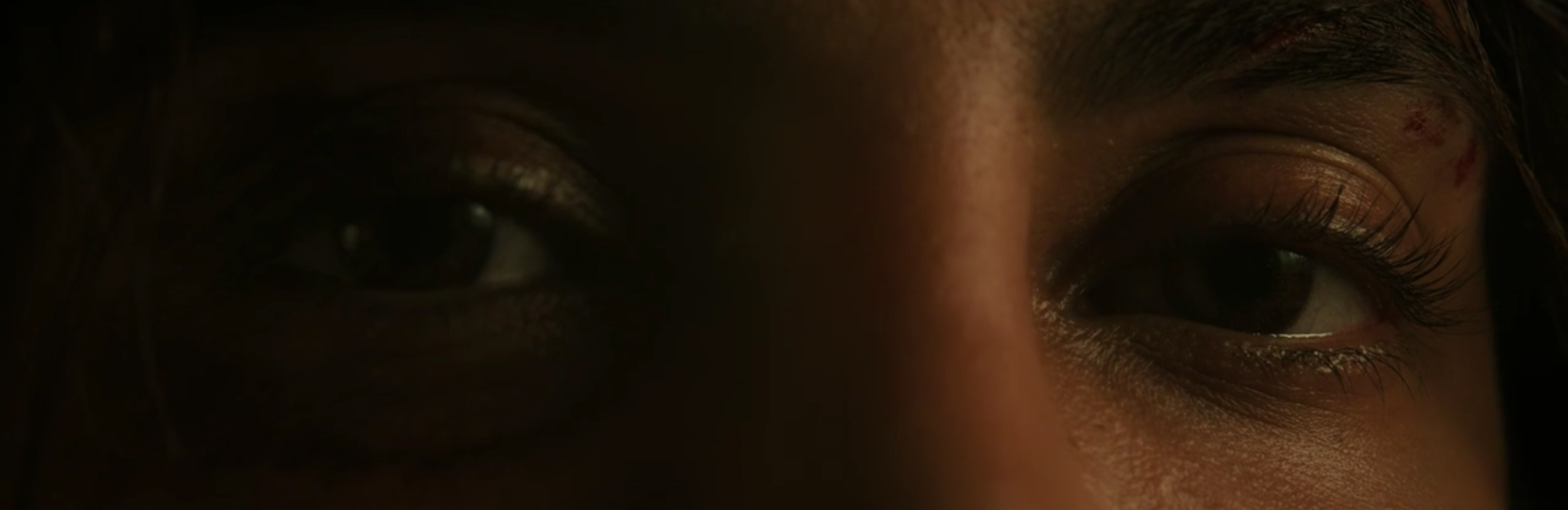 Nadia stares down her attacker.