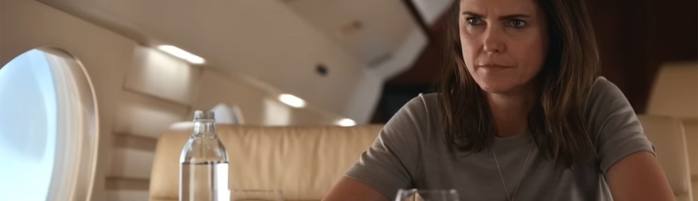 Kate gives a derisive stare.