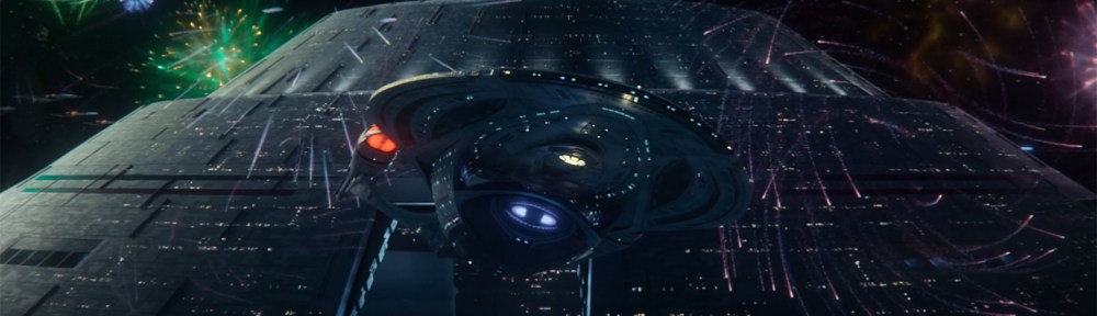 The USS Enterprise-E leaves Spacedock.