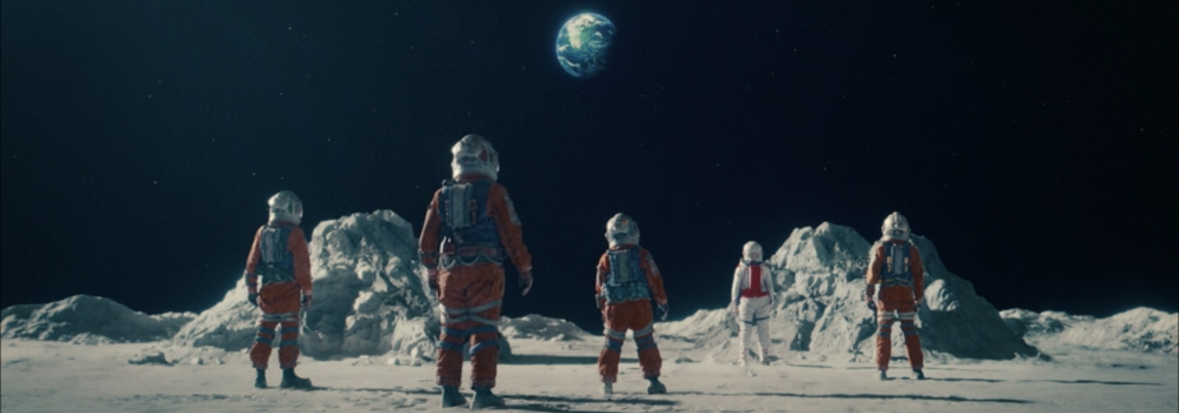 They look up at the blue gem of Earth in the sky.