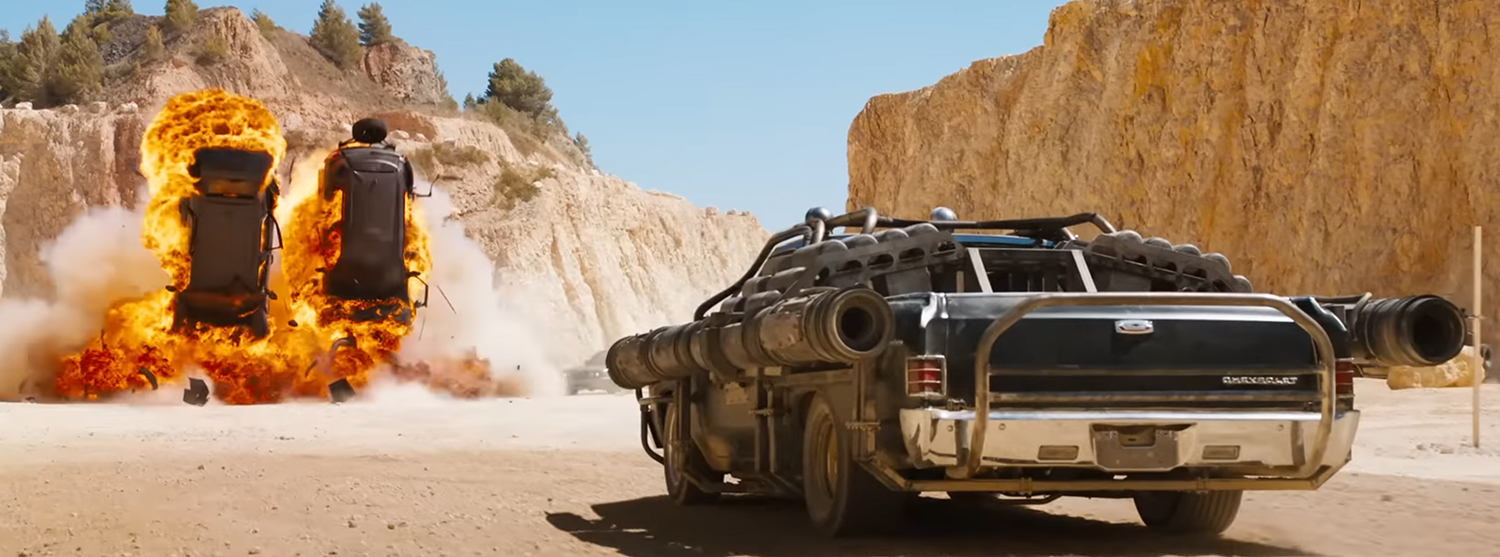 Cars explode into the air.