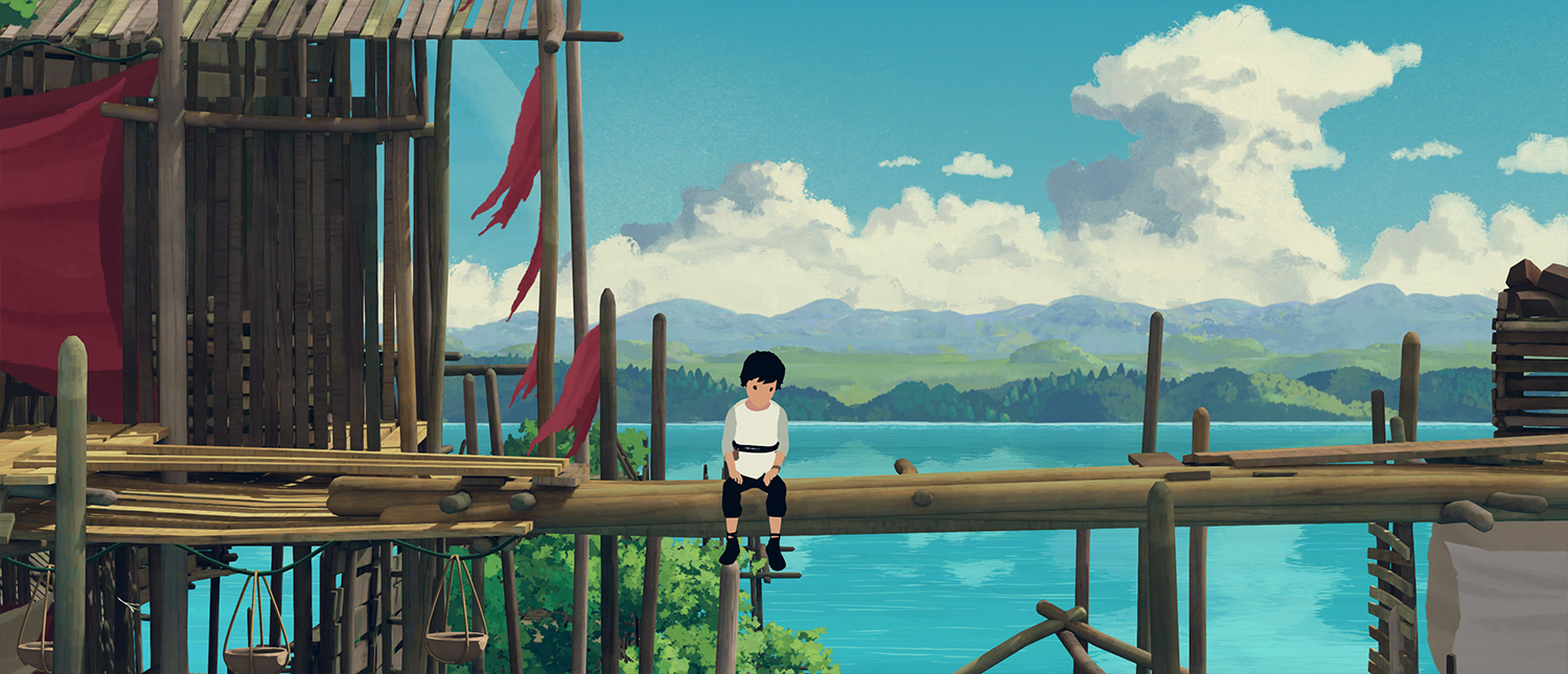 Lana sits in her village.