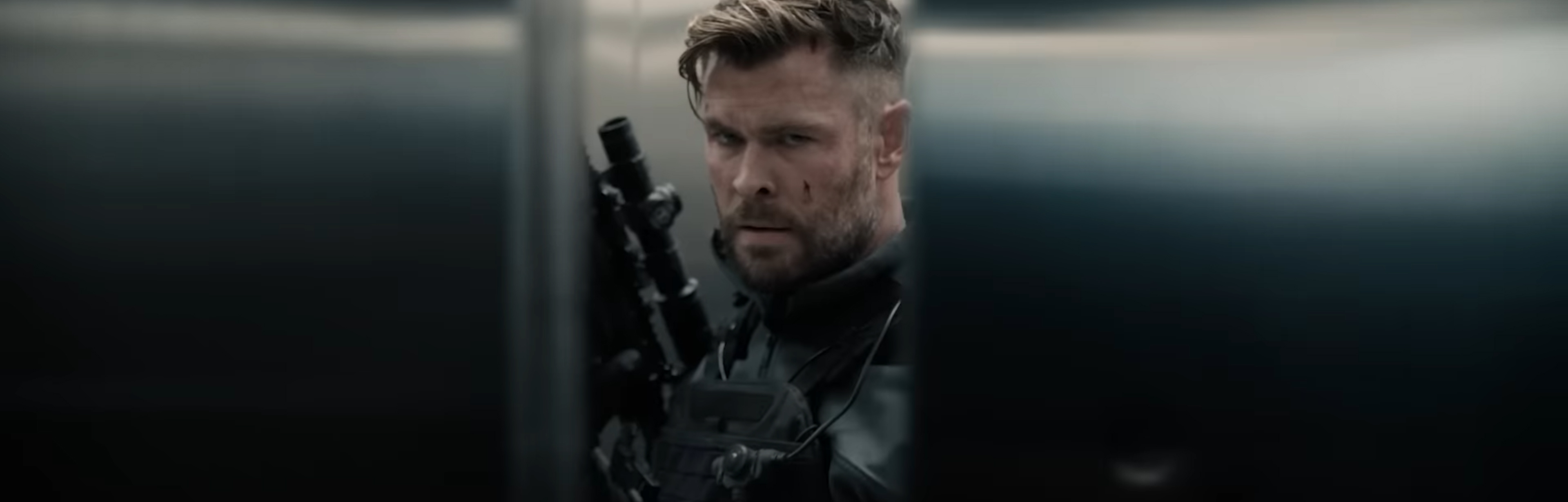 Chris Hemsworth stare down in an elevator.