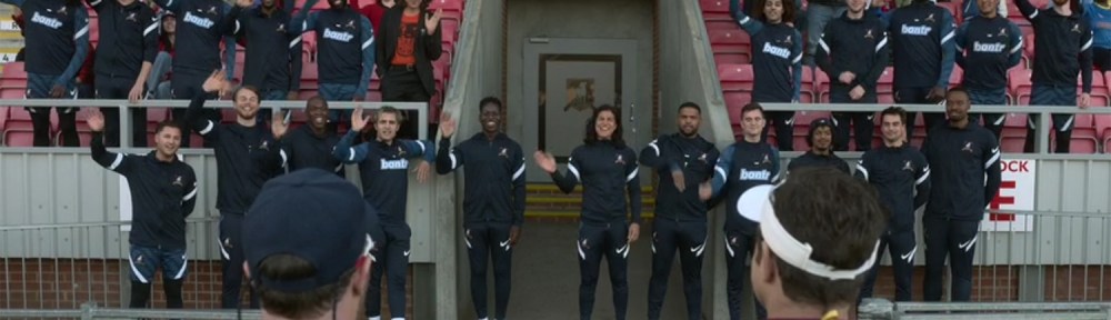 The team waves goodbye