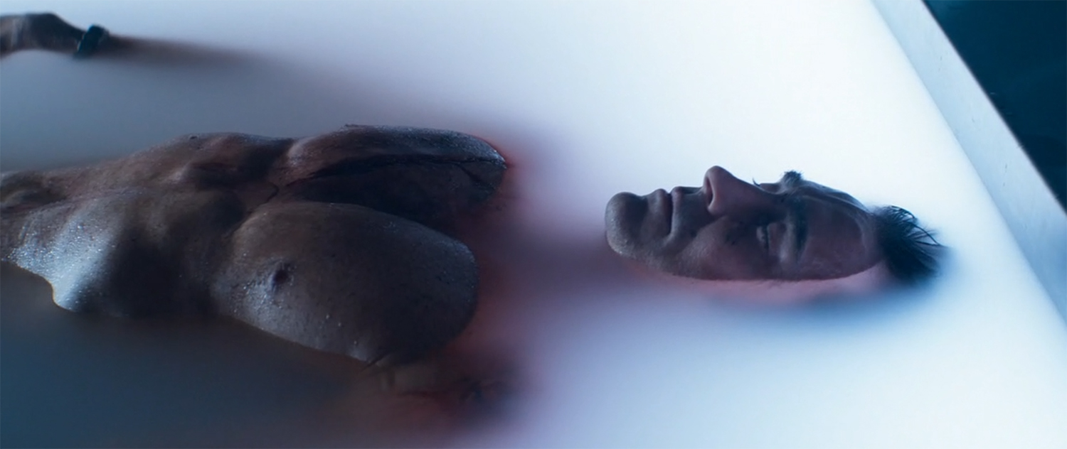 Brother Day lies in a pool recovering from his wounds.