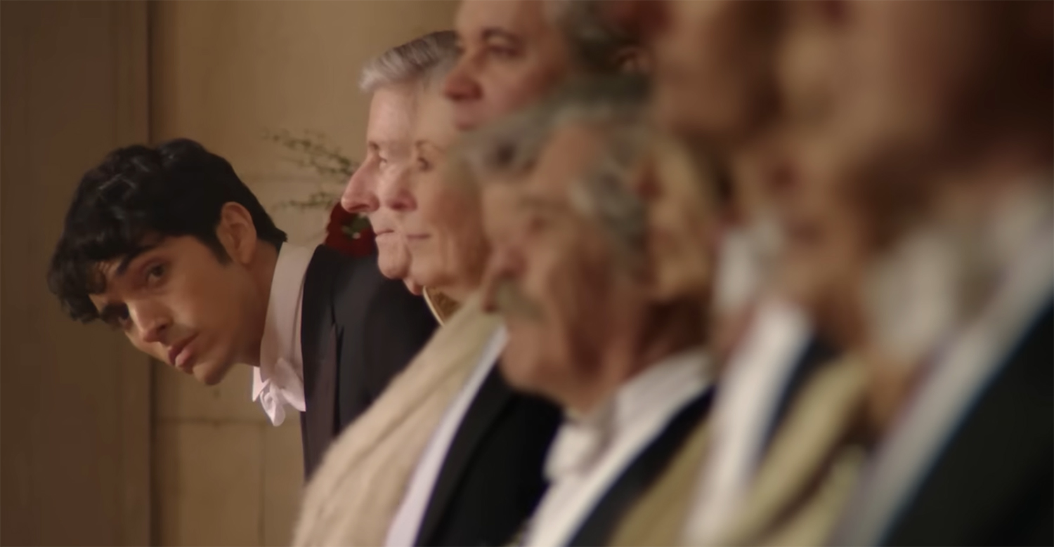 Peering out from the line.