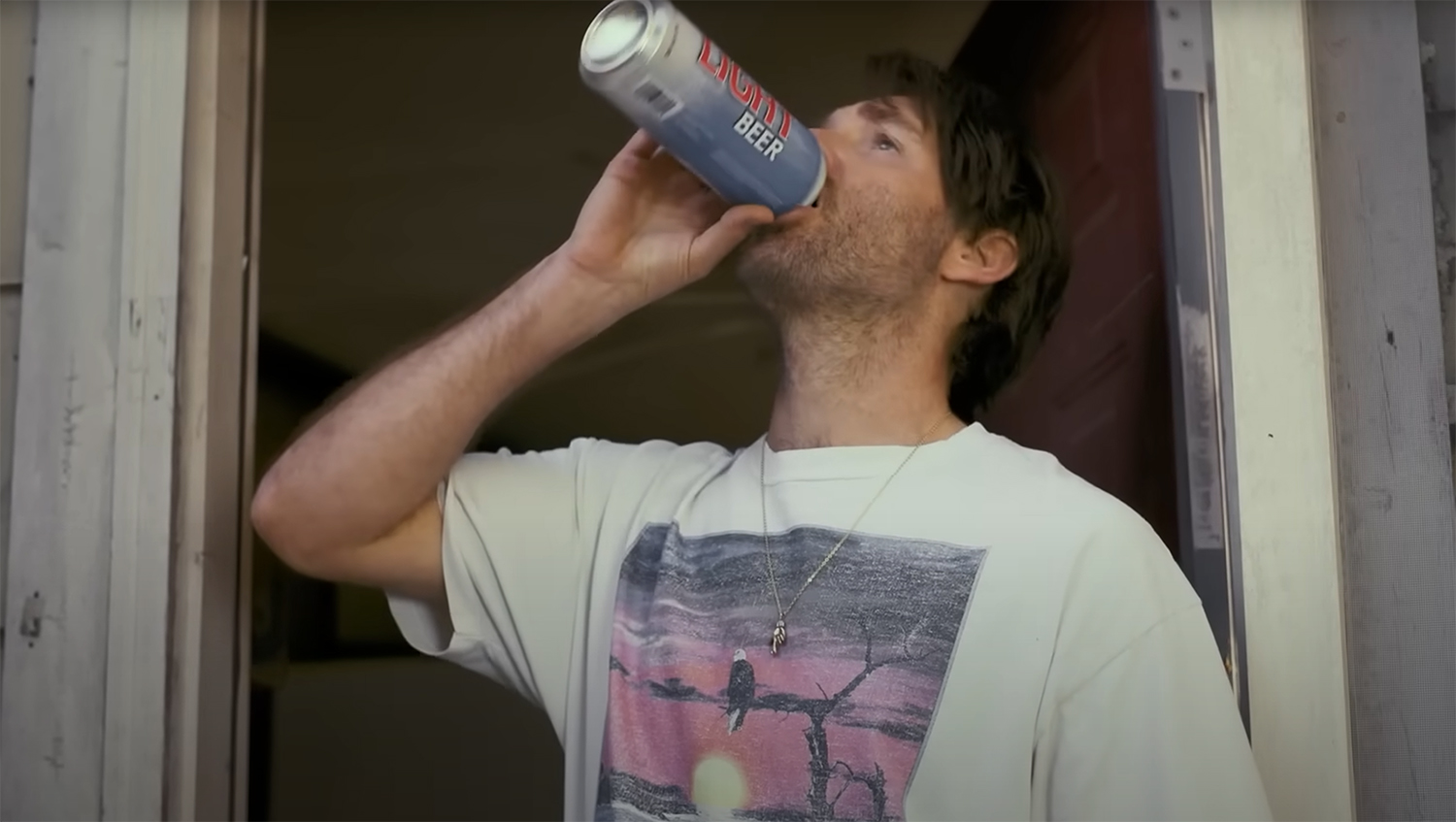 Doug drinking a beer.