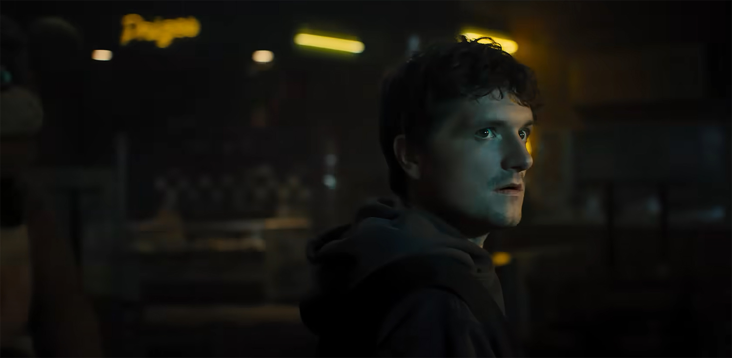 Mike looks around with Freddy lurking in the background.