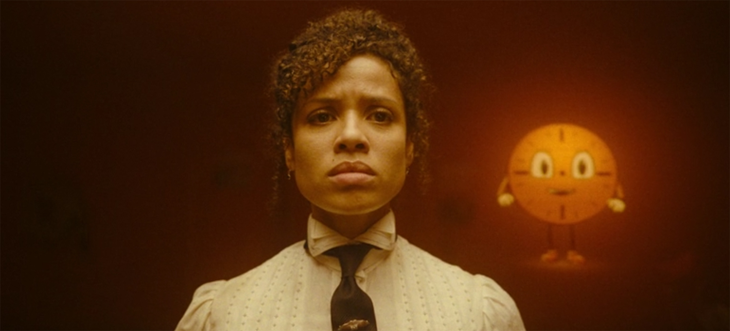 Renslayer looks on as she murders people, Miss Minutes smiling in glee in the background.