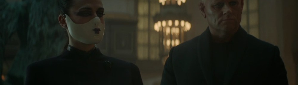 The Adjudicator with their mask.