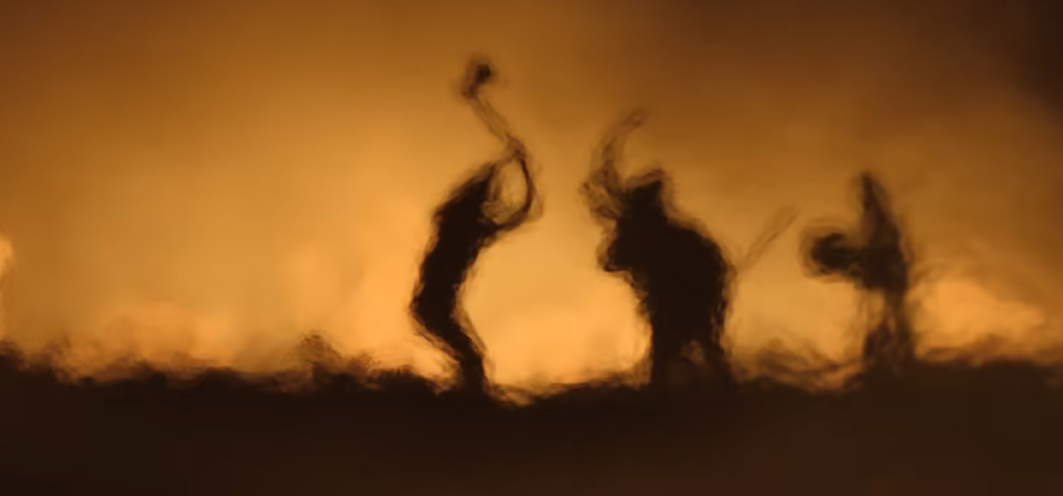 Looking through the light haze of a fire.