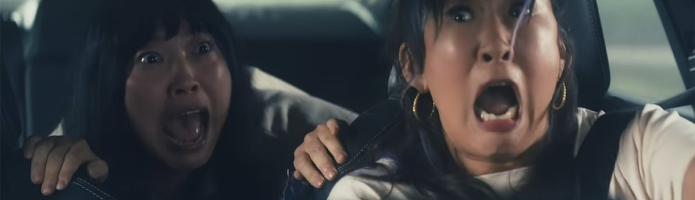 Awkwafina and Sandra Oh screaming.