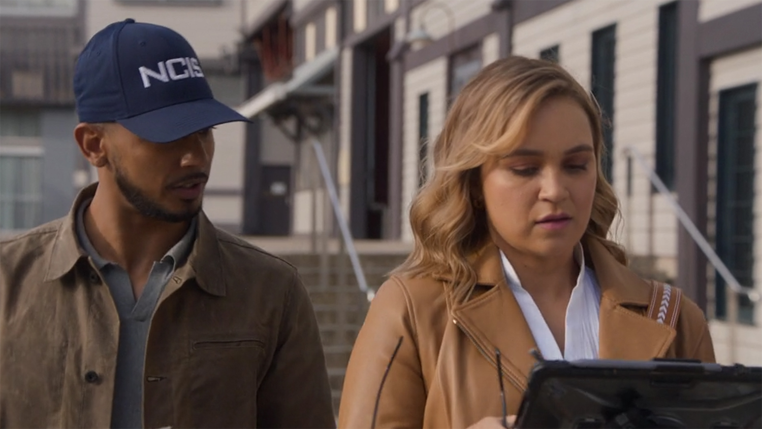 looking at a laptop.