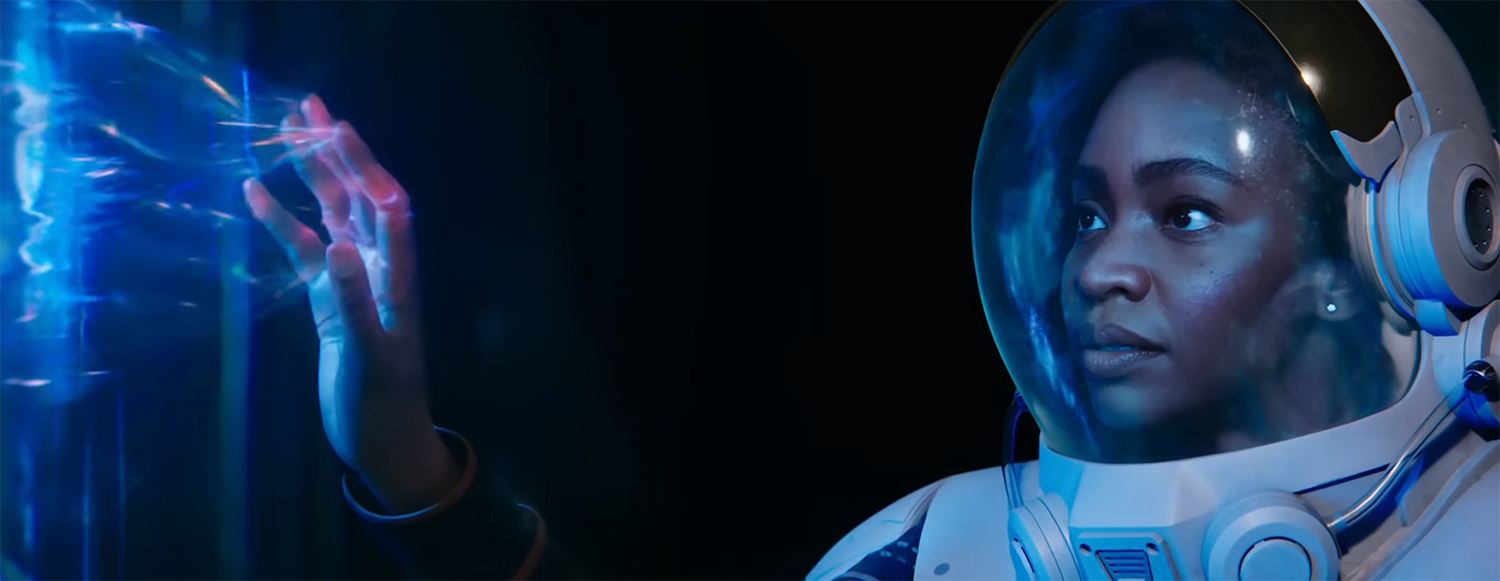 Rambeau touches a portal.