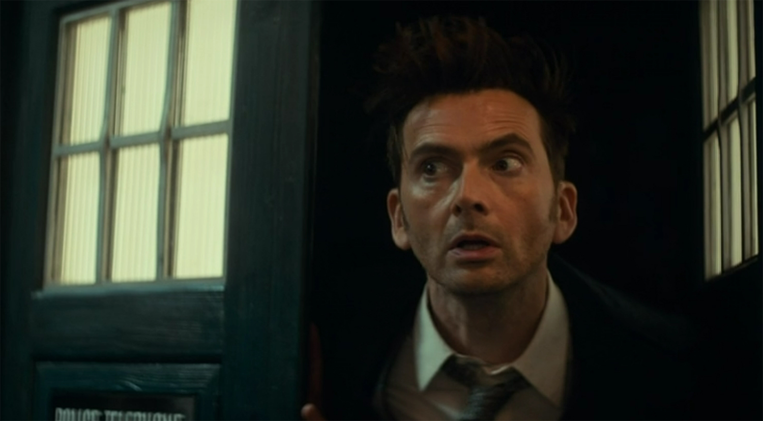 David Tennant poking his head out of the TARDIS.