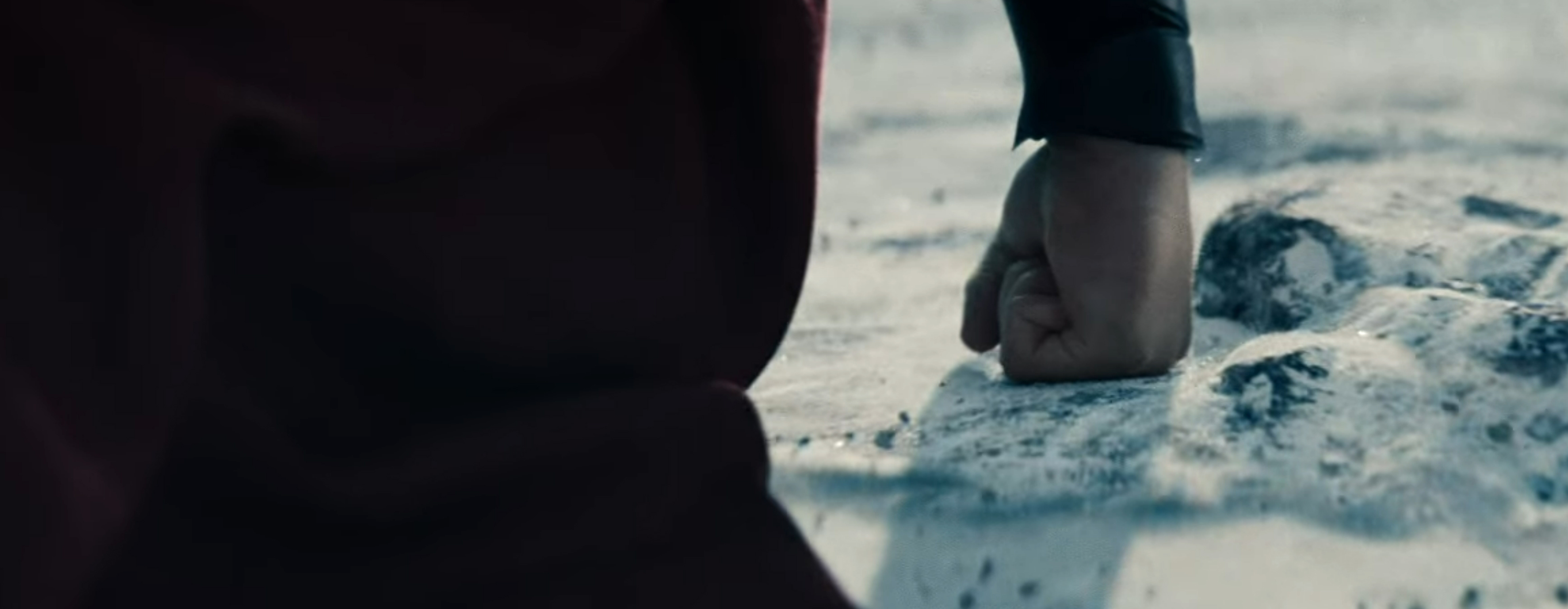 Superman takes off from the ice.