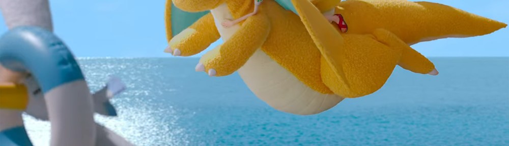 Haru and Psyduck on the back of a Dragonite chasing a Wingull.